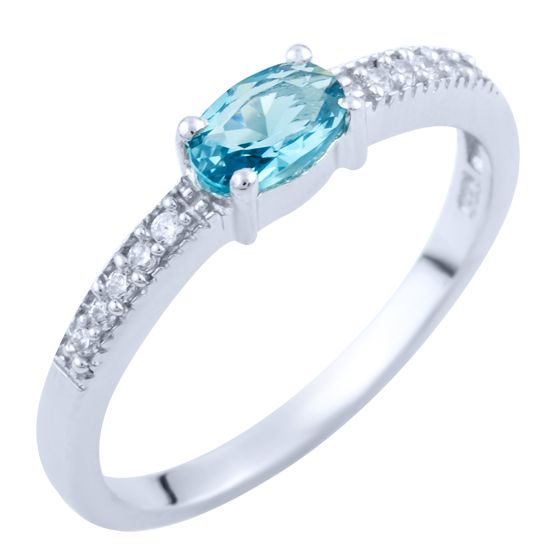Серебряное кольцо с топазом Лондон Блю 0.418ct, фианитами