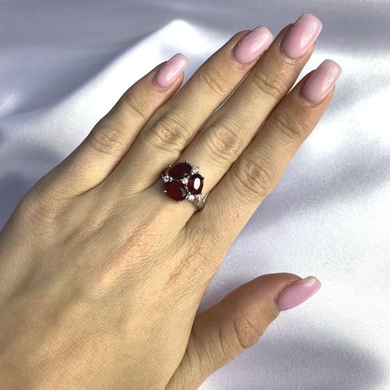 Silver ring with a ruby