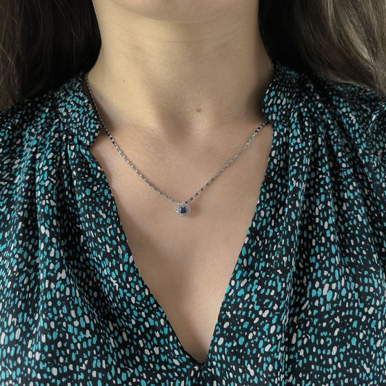Silver pendant with 0.48ct sapphire and fianites