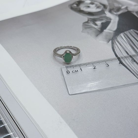 Silver ring with emerald
