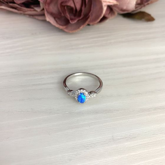 Silver ring with an opal