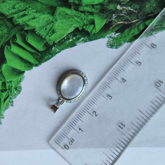 Silver pendant with phianites, mother-of-pearl