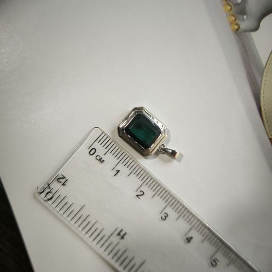 Silver pendant with topaz London Blue 2.675ct