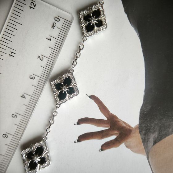 Silver bracelet with onyx, fianites