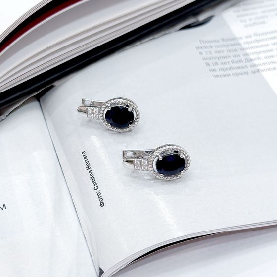 Sterling silver earrings with 4.927ct sapphire, pave diamonds