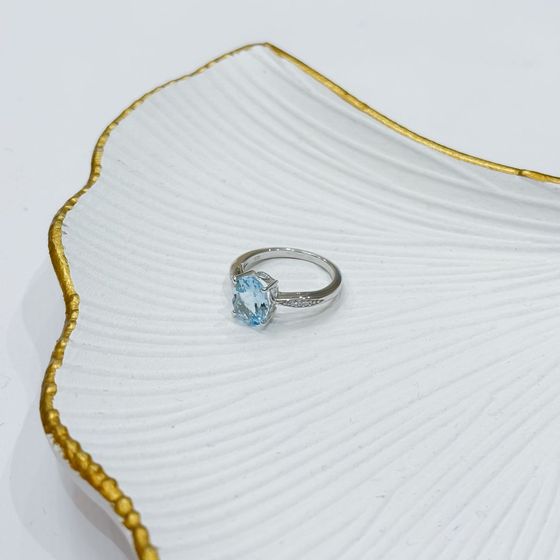Silver ring with a topaz
