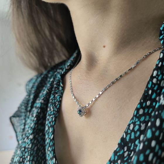 Silver pendant with 0.48ct sapphire and fianites