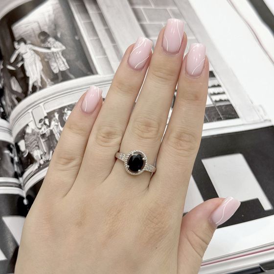 Sterling silver ring with 2.602ct sapphire, pave diamonds