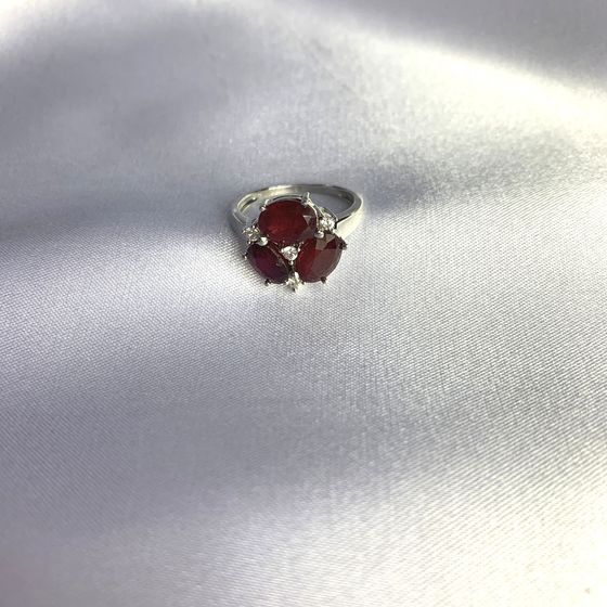 Silver ring with a ruby