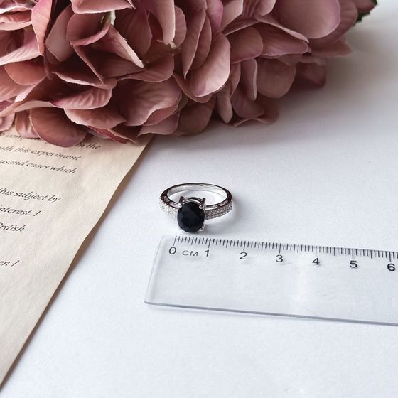 Silver ring with sapphire