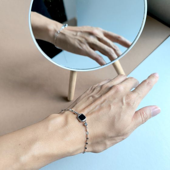 Silver bracelet with onyx, fianites