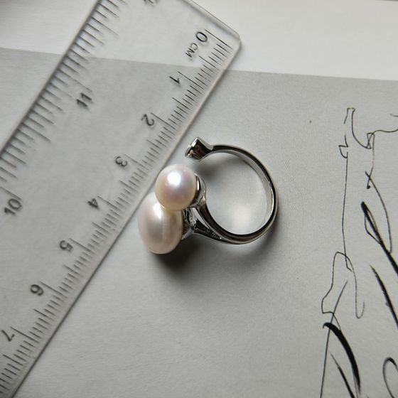 Silver ring with baroque pearls, fianites