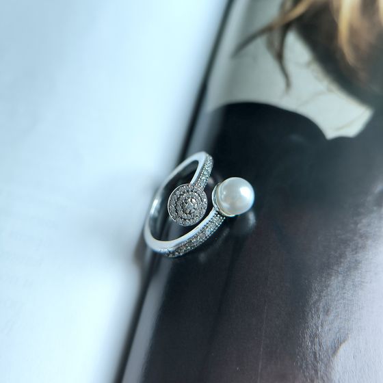 Silver ring with pearls and cubic zirconia