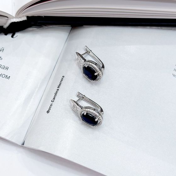 Sterling silver earrings with 4.927ct sapphire, pave diamonds