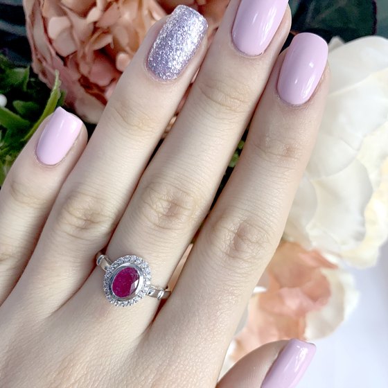 Silver ring with a ruby