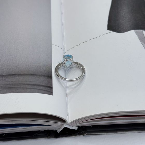 Silver ring with a topaz