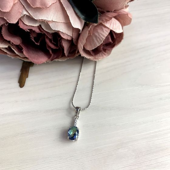 Silver pendant with a mystic topaz