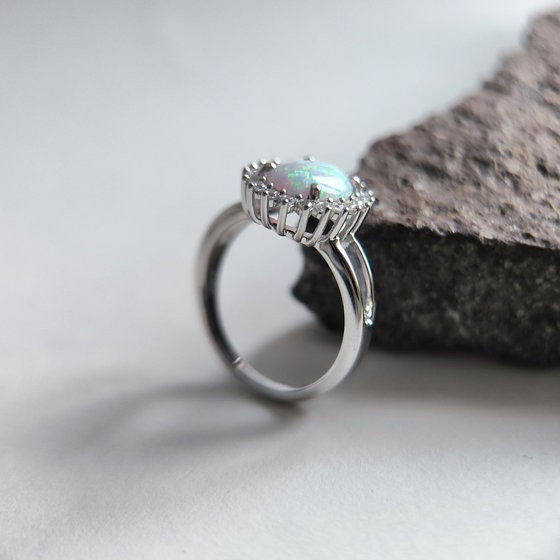 Silver ring with a 1.265-carat opal and cubic zirconia