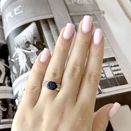 Sterling silver ring with 3.507ct sapphire, pave diamonds