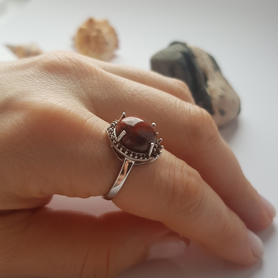 Silver ring with white topaz.