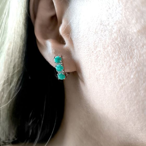Silver earrings with a 2.006-carat emerald and cubic zirconia