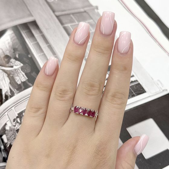 Sterling silver ring with 1.672ct ruby and fianites