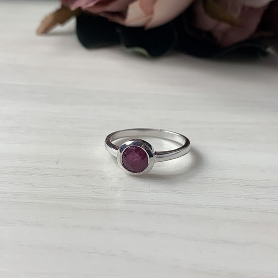 Silver ring with a ruby